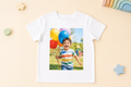 Personalised children's white T-shirt with birthday adventure photo print studio front