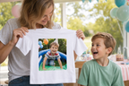 Personalised children's T-shirt lifestyle gift moment with birthday photo print